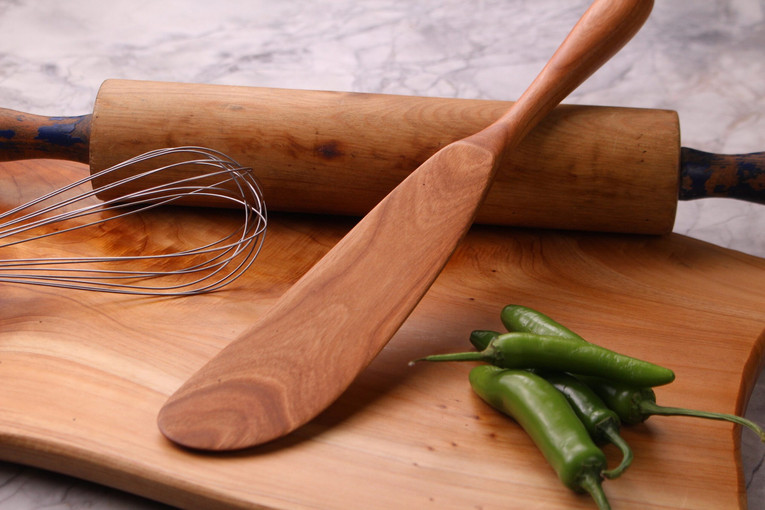 Handmade wooden right handed spurtle kitchen utensil carved from Walnut wood